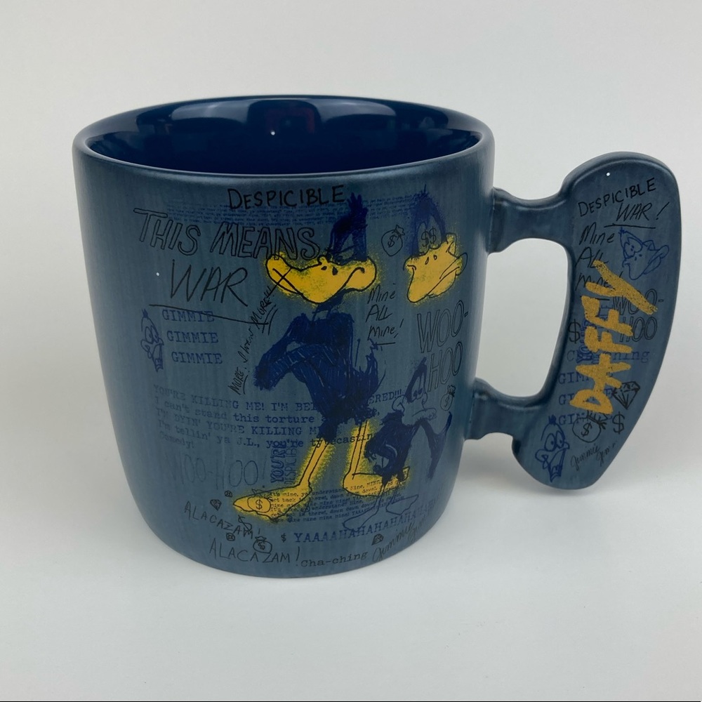 Six Flags Looney Tunes Daffy Duck This is War  Sketch Coffee Mug